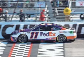  ?? MIKE CAUDILL/AP ?? Denny Hamlin drives during the NASCAR Cup Series auto race at Richmond Raceway on Sunday in Richmond, Va.