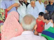  ?? PTI ?? Rahul Gandhi with family members of the victims during his visit to Gorakhpur on Saturday.