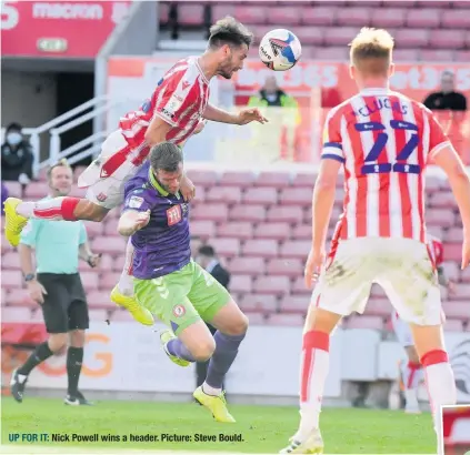  ??  ?? UP FOR IT: Nick Powell wins a header. Picture: Steve Bould.