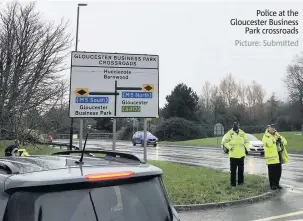  ?? Picture: Submitted ?? Police at the Gloucester Business Park crossroads