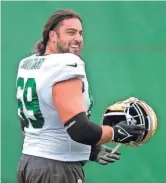  ?? SAMANTHA MADAR / USA TODAY NETWORK-WIS ?? David Bakhtiari was on and off the practice field as he worked back from a torn ACL but played only 27 snaps.