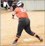  ?? Westside Eagle Observer/MIKE ECKELS ?? Keeley Elsea makes contact with the ball, sending it into left field for a base hit during the Gravette-Springdale softball game in Gravette on March 12. During the Lady Panther-Lady Lions contest in Clarksvill­e on April 15, Elsea had two hits and one run for the night.