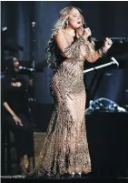  ?? — GETTY IMAGES FILES ?? Mariah Carey performs at Madison Square Garden on August 19.