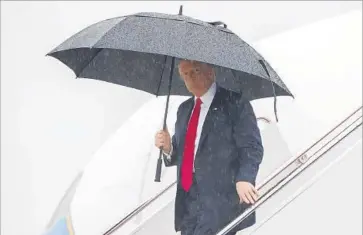  ?? Evan Vucci Associated Press ?? PRESIDENT TRUMP arrives at Andrews Air Force Base, Md., from New York after announcing he had ousted Chief of Staff Reince Priebus and named Secretary of Homeland Security John F. Kelly to replace him.