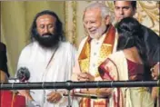  ?? HT FILE ?? AoL foundation head Sri Sri Ravi Shankar and PM Narendra Modi at the world culture festival in New Delhi, last year.