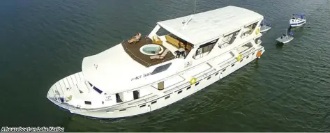  ??  ?? A houseboat on Lake Kariba