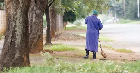  ?? Picture: Nigel Sibanda ?? SWEEPING CHANGES. A domestic worker sweeps outside a Parkview home in Johannesbu­rg this week. Domestic workers must now get hourly pay rate of R19.90. Last year, the amount was set at R15 for the sector.