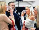  ?? ANGELA PETERSON, MILWAUKEE JOURNAL SENTINEL ?? Maggie Dunn (left), Ivan Araya, Kari Stowe and Katrina Baxter attend The Journal Sentinel Food & Wine Experience in 2017. This year's event will be held outdoors.