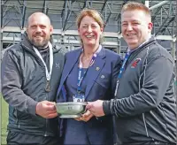  ??  ?? It was an emotional day for SRU vice-president Dee Bradbury pictured here with Oban Lorne coach Corrie Louw, left, and team manager Darrell Williams.