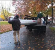  ??  ?? Melissa Schuman - MediaNews Group The day before the start of the Spooktacul­ar, NYRA workers unload the racetrack canoe during setup.