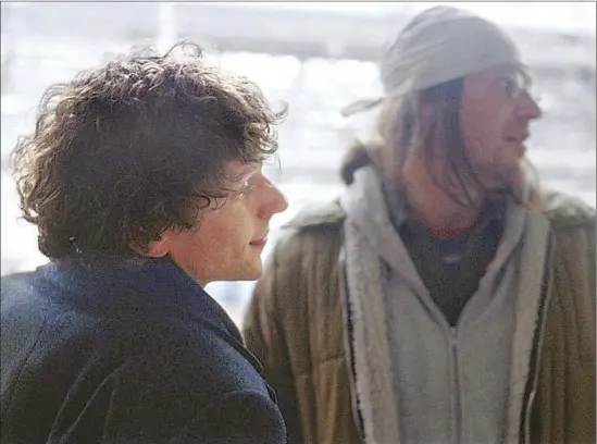  ?? Jakob Ihre
A24 ?? JESSE EISENBERG, left, as reporter David Lipsky and Jason Segel as David Foster Wallace on the cusp of greatness in James Ponsoldt’s “The End of the Tour.”