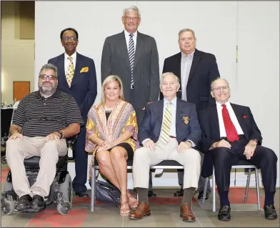  ?? Terrance Armstard/News-Times ?? Inductees: The seventh annual Induction of the Union County Sports Hall of Fame was held Saturday at the El Dorado Conference Center. Pictured, standing from left to right, Jimmy Howard, John Gross and Gary Miller. Seated, Mike Bender's son Brent...