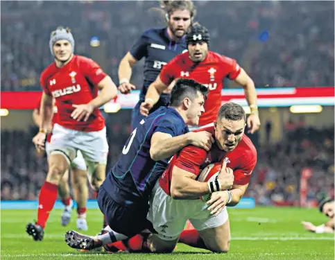  ??  ?? Welsh dominance: George North bundles his way over to make it 14-3 to Wales; (below) Doddie Weir at the match