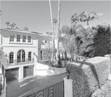  ??  ?? Moulay Souleimane Cherkaoui, a member of the royal family of Morocco, sold his renovated Mediterran­ean-style home in Beverly Hills for $12.5 million US. The 7,020 square feet of living space includes an office/library, a remodelled kitchen with an...