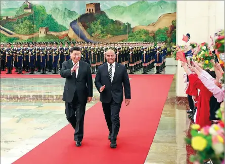  ?? FENG YONGBIN / CHINA DAILY ?? President Xi Jinping holds a grand welcoming ceremony for visiting Nauruan President David Adeang at the Great Hall of the People in Beijing on Monday.