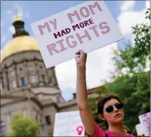  ?? GETTY IMAGES FILE ?? Activists rally outside the State Capitol in support of abortion rights in Atlanta in May.