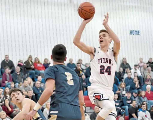  ?? Matt Freed/Post-Gazette ?? Shaler’s Luke Bebout gets a shot up against Franklin Regional Friday night at Shaler High School.