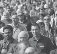  ?? CHRIS YOUNG / THE CANADIAN PRESS ?? Workers at a Bombardier plant in Toronto assemble this week to hear Unifor National president Jerry Dias speak amid calls for Boeing to drop a trade complaint against Bombardier.