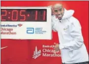  ?? AFP ?? Mo Farah celebrates his Chicago Marathon win on Sunday.