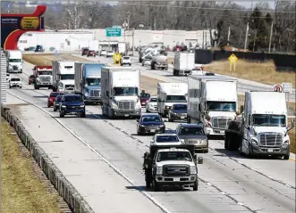  ?? TY GREENLEES / STAFF ?? View of I-75 southbound in Moraine. A wrong-way driver crashed with another vehicle in the southbound lanes near the road sign and killed three people on Sunday evening.