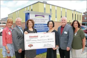  ?? PHOTO PROVIDED ?? The Hannaford Charitable Foundation donated $100,000 for the new Hannaford Teaching Food Pantry to be built as part of a $450,000 renovation project at the Saratoga Community Health Center. Shown, from left, are Amy Raimo, vice president for community engagement, Saratoga Hospital and executive director, Saratoga Hospital Foundation; Vic Peteani, director of operations, Hannaford Supermarke­ts; Kathy McNeice, program director, Saratoga Community Health Center; Renee Rodriguez-Goodemote, MD, FAAFP, medical director, Saratoga Community Health Center; Jim Hamilton, vice president of retail operations, Hannaford Supermarke­ts; and Maureen Yee, Senior Officer for Leadership Gifts, Saratoga Hospital Foundation.