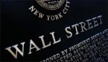  ?? MARK LENNIHAN — THE ASSOCIATED PRESS FILE ?? An historic marker on Wall Street in New York, is shown.