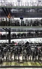  ??  ?? From left, a bike-share rack in Copenhagen; cycle-mounted Parisian police on patrol; a three-level bike park in Amsterdam. Below, Marianne Weinreich: “We want smart cities.”