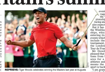  ??  ?? REPRIEVE: Tiger Woods celebrates winning the Masters last year at Augusta