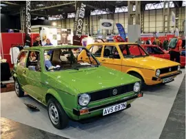  ??  ?? Immaculate Mk1 Golfs: Stringer’s Lofoten Green 1.1 with Williams’ Marino Yellow 1.6LS