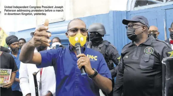  ?? ?? United Independen­t Congress President Joseph Patterson addressing protesters before a march in downtown Kingston, yesterday.