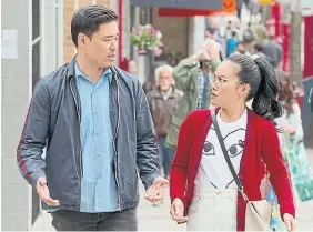  ?? NETFLIX ?? In “Always Be My Maybe,” Ali Wong, right, plays a successful chef who reconnects with her childhood sweetheart, played by Randall Park.