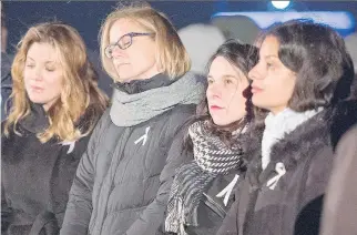  ?? RYAN REMIORZ /THE CANADIAN PRESS ?? Sophie Grégoire Trudeau, left, Catherine Bergeron, sister of Geneviève, who was killed in the Polytechni­que massacre, Montreal Mayor Valérie Plante and Quebec deputy premier Dominique Anglade attend Wednesday evening’s ceremony on Mount Royal to...