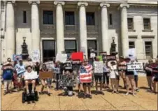  ?? KATHLEEN CAREY - DIGITAL FIRST MEDIA ?? Protesters gathered outside the Delaware County Courthouse Saturday afternoon to decry the first 100 days of President Donald Trump.