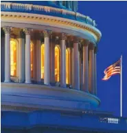  ?? AP PHOTO/CAROLYN KASTER ?? An American flag flies on the Capitol Dome in Washington.