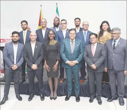  ?? ?? Suriname’s President Chandrikap­ersad Santokhi is third from right in the front row. Finance Minister Dr Ashni Singh is second from right in the front row.