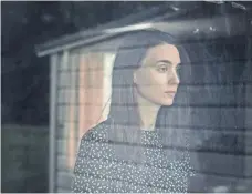  ??  ?? Rooney Mara stars as a wife dealing with the loss of her husband and unaware he lingers.