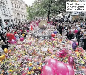  ??  ?? Floral tributes in St Ann’s Square after the attack