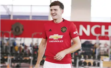  ??  ?? World’s most expensive defender, Harry Maguire joins Manchester United from Leicester City for £80m