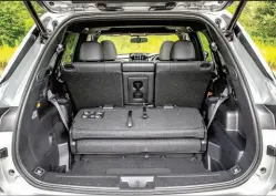  ?? Mitsubishi ?? The Outlander PHEV, pictured, has a standard third-row seat and more overall cargo space than the RAV4 Prime.