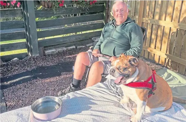  ?? ?? COMMITTED: Languages teacher John Nolan, pictured with his bulldog, Carmella, was passionate about German and influenced countless pupils.