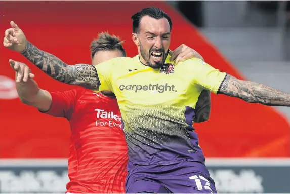  ?? Steve Bond/Pinnacle ?? Exeter striker Ryan Bowman is yet to score this season, but his value to the Grecians in leading their frontline cannot be underestim­ated