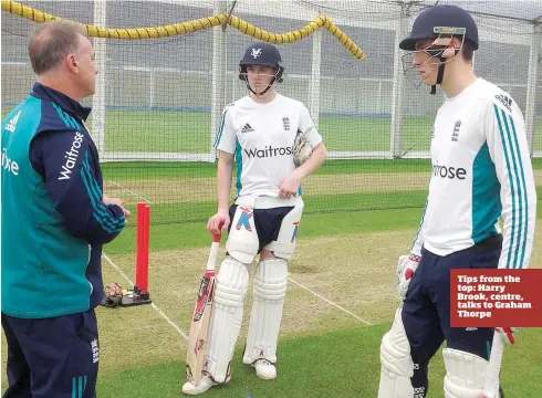  ??  ?? Tips from the top: Harry Brook, centre, talks to Graham Thorpe