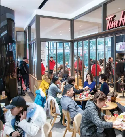  ??  ?? Canadian coffee chain Tim Hortons, which is expanding rapidly in China, plans to have 1,500 outlets in the count