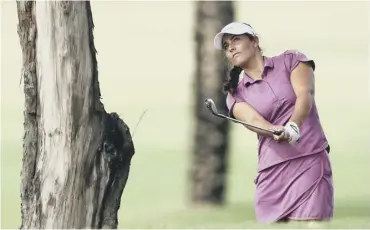  ??  ?? Kelsey Macdonald plays her second on the first hole in the third round of the Dubai Ladies Classic.