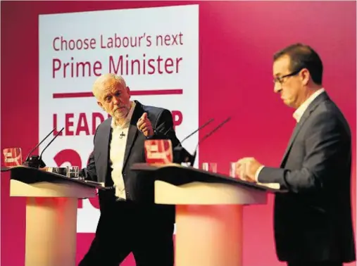  ??  ?? NO LOVE LOST: Jeremy Corbyn, left, retaliates as Owen Smith makes a series of personal attacks during the hustings at Glasgow’s SECC