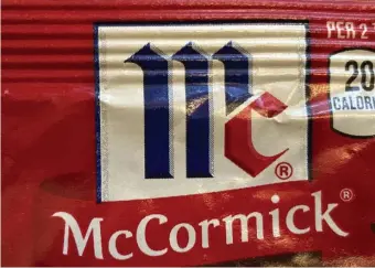  ?? AP PHOTOS ?? ICONIC CAP: Spice maker McCormick & Co. is buying the parent of Cholula Hot Sauce from private-equity firm L Catteron for $800 million, expanding its reach in the hot sauce category.