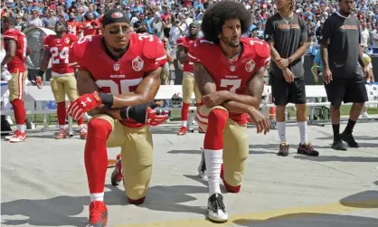  ?? Photograph: Mike McCarn/AP ?? Eric Reid (left) and Colin Kaepernick protested together when they were teammates on the San Francisco 49ers.