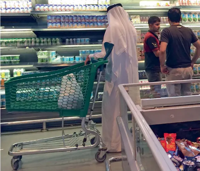  ?? — AFP ?? The Qatar conflict has not only affected workers and families, it has also disrupted trade and delayed projects in Qatar where prices of food and other every day items registered a steep rise.