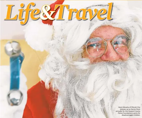  ??  ?? Kevin Murphy of Ellicott City dresses up as Santa Claus annually for the Howard County Police Foundation’s party for disadvanta­ged children.