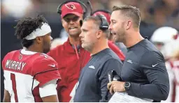  ?? CHUCK COOK/USA TODAY SPORTS ?? Cardinals head coach Kliff Kingsbury talks to quarterbac­k Kyler Murray (1) in the first quarter against the Saints on Sunday.